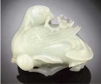 18th Century A pale celadon jade carving of a bird